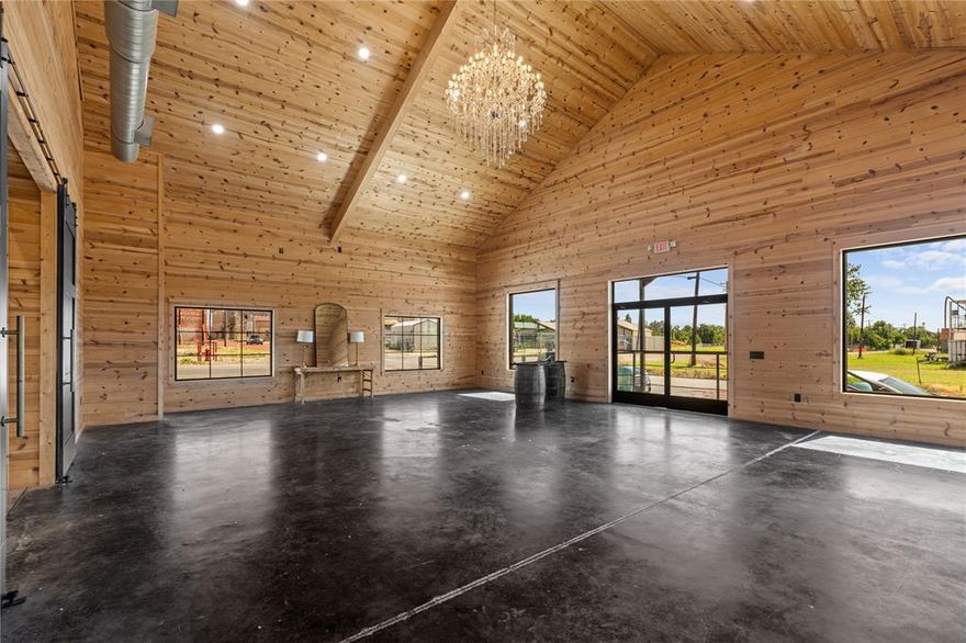 Welcome to your next big opportunity—an impressive 11,000+ sq ft event venue unlike anything else in the area. This property blends rustic farmhouse vibes with industrial character and an elegance that’s ready to shine.

With a flexible open layout, the space has already hosted weddings, proms, family reunions, holiday markets, and intimate showers in the cozy front foyer. Whether you're expanding an event business or launching something new, this is the blank canvas you've been looking for.

Two attached silos offer one-of-a-kind potential—envision them as a bridal suite, private lounge, or Instagram-worthy bar. A finished concrete drive leads to a large roll-up garage door for seamless vendor access. Inside, tables, chairs, and a wide variety of décor are ready to go. The soaring ceilings and open floor plan allow for creative layouts, lighting, and guest experiences.

The possibilities go far beyond events: reimagine the space as a showroom, shared workspace, or even multi-family living. There's plenty of land to build out additional residential units, expand parking, add a commercial kitchen, or develop outdoor event areas.

This property hasn’t reached its full potential—but with vision, polish, and the right strategy, it could become the region’s go-to destination. For the right buyer, the opportunity is as expansive as the space itself.