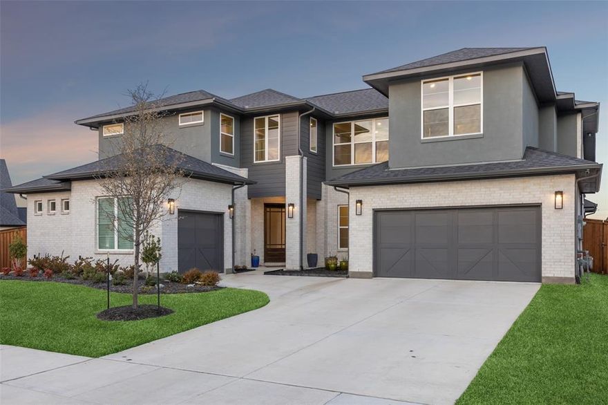 This exceptional semi-custom Shaddock home, built in 2024, is a refined statement of modern luxury, thoughtfully designed and impeccably upgraded throughout. Expansive indoor-outdoor living is highlighted by a dramatic 16’ sliding glass door that opens to a wonderful backyard ideal for entertaining, featuring a covered patio overlooking a pool-sized yard. Inside, the living room is anchored by a striking fireplace, creating a warm and sophisticated gathering space. An upgraded front door, enhanced stair system, and designer railing set an elegant tone upon entry, complemented by a private study enclosed by French doors, perfect for working from home. The versatile floorplan offers a 5th bedroom with a 5th full bath, a private media room with double doors, and the convenience of a three-car garage. At the heart of the home, the show-stopping kitchen showcases Level 5 waterfall island sides, upgraded KitchenAid appliances, a 96” built-in SubZero refrigerator, and beautifully upgraded cabinetry with roll-out and pull-out custom drawers, soft-close features, and designer hardware, all accented by Level 6 tile extended to the ceiling with an offset design. The spa-inspired primary bath impresses with a freestanding soaking tub and frameless glass shower, while elevated finishes continue throughout with nail-down wood flooring, upgraded carpet, upgraded tile in every bath, and custom paint. Completing the experience are extensive audio, video, and security enhancements along with upgraded electrical featuring added GFCI and LED options, delivering a home that is as intelligent as it is elegant, crafted for those who expect nothing less than exceptional.