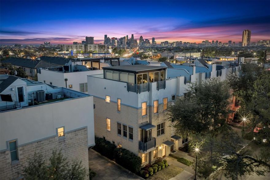 Stunning, fully updated townhome in a prime, walkable Dallas location! This modern home features wood flooring throughout, no carpet, and an open-concept layout designed for comfortable living and entertaining. The upgraded kitchen showcases custom cabinetry, marble countertops, a stylish backsplash, an upgraded range, and more. Each of the 3 bedrooms has a private bath. Guests can use the powder bath on the second level.

The lower level has been remodeled with large-format tile flooring and a renovated bathroom, ideal for guests or a private suite. The primary bathroom has been partially remodeled, with an updated shower, new flooring, and an added privacy door.

Enjoy year-round relaxation and Downtown Dallas views in the enclosed appx. 250 sqft. rooftop retreat (not counted in tax rolls) featuring new flooring, climate control, and a hot tub. Additional upgrades include smart home features (switches and thermostat). Exterior improvements include stone treatment for leak prevention and mildew resistance, as well as a resealed second-floor patio. This home has had many custom upgrades done throughout the years and must be seen to truly appreciate! Rooftop deck has a mini split system and a working sink and cooktop. The ultimate outdoor paradise!

Located within walking distance to shopping, dining, and entertainment, with easy access to major thoroughfares and popular outdoor recreation areas.
