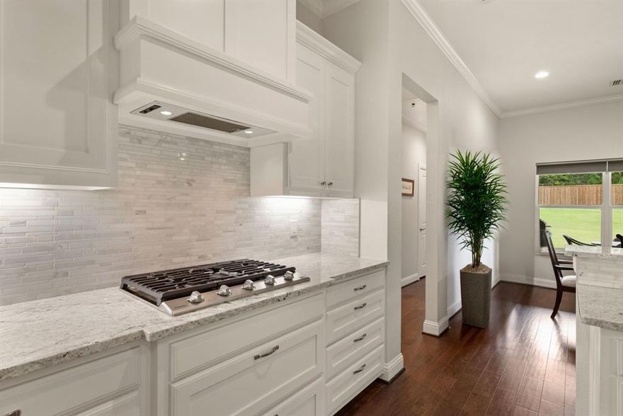 Welcome to Lake Kiowa that is packed with unique amenities that make everyday living feel like a getaway! Residents enjoy two beautiful beaches complete with playgrounds, pavilions, and restrooms, along with courts for basketball, tennis, and pickleball. A community garden near the dam provides fresh produce, while scenic trails and a fun disc golf course offer endless outdoor activities. Walking paths wind through both open spaces and wooded areas, leading to Little Fox Pond—one of the community’s favorite fishing spots. Beyond the lake and golf course, there’s truly something for everyone here. This charming home features 3 bedrooms, 3 bathrooms, soaring ceilings, decorative lighting, and an impressive insulated 3-car garage. Upstairs, a versatile loft with a half bath makes the perfect playroom, guest space, or hobby room. You’ll love the open-concept living and kitchen area, highlighted by rich wood floors, a cozy gas fireplace, granite countertops, stainless steel appliances, a gas cooktop, and classic white cabinetry with built-in lighting that adds warmth and character. The primary suite is a peaceful retreat, offering a spa-like bath with quartz countertops, a spacious walk-in shower, and a relaxing soaking tub. Step outside to a large covered patio and expansive backyard, an ideal blank canvas ready for your dream outdoor oasis.