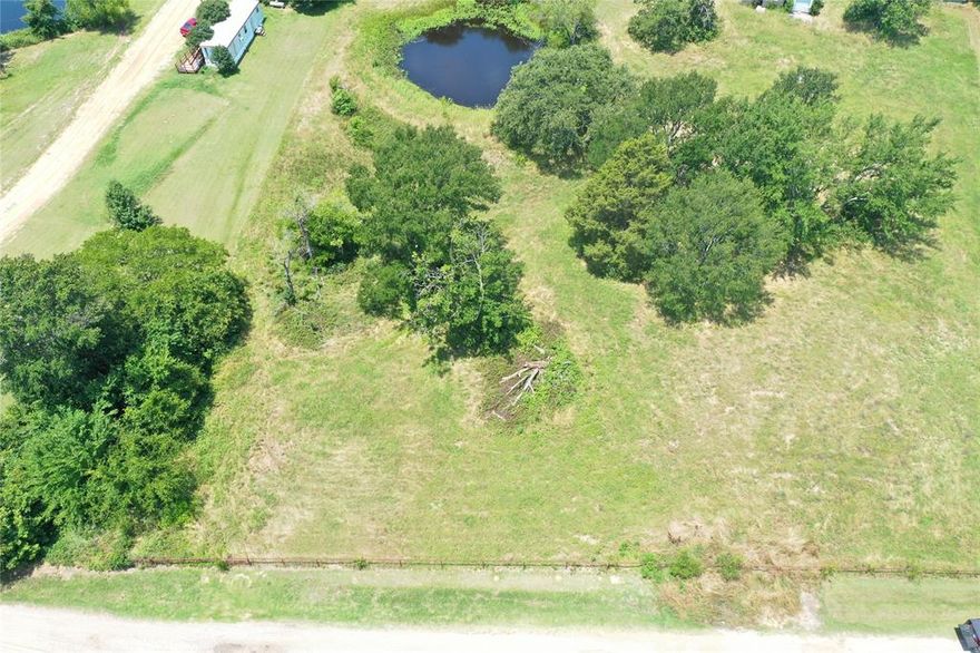 Bring your imagination to this rare 4-acre cul-de-sac property, full of opportunity and ready for your vision. This versatile tract is already equipped with an 80' x 30' metal building with attached covered carport, a 10' x 24' shed, pond, water meter, electric, and septic system, making it ideal for immediate use or future development. Located in Mabank ISD, this property is perfectly suited for agriculture, hobby farming, or creating your dream estate. Enjoy a peaceful setting with convenient access to Cedar Creek Lake and major routes toward Dallas, Tyler, and Canton. Buyers have the flexibility to purchase the entire 4 acres or consider smaller 1-acre parcels if preferred. (Reference MLS# 21216343, 21216321, 21216352, 21216383)