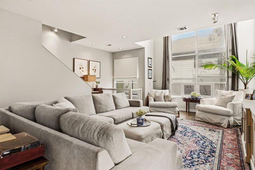 Gorgeous 3-story contemporary townhome in the heart of Uptown! Completely remodeled in 2020 with high-end
finishes throughout! First floor features a bedroom with ensuite bath and sliding doors to fenced courtyard. Second level features an open floor plan with abundant hardwood flooring, 9 foot ceilings, built-ins, & floor to ceiling windows. Gourmet kitchen features SS appliances, quartz counters, subway tile backsplash, brushed gold hardware, custom painted cabinetry, & island. Third level has an incredible master suite with sitting area, large closet & luxury bath with quartz counters, dual sinks, glass-tiled shower, & jetted tub. Third bedroom with ensuite bath and office complete the third floor.