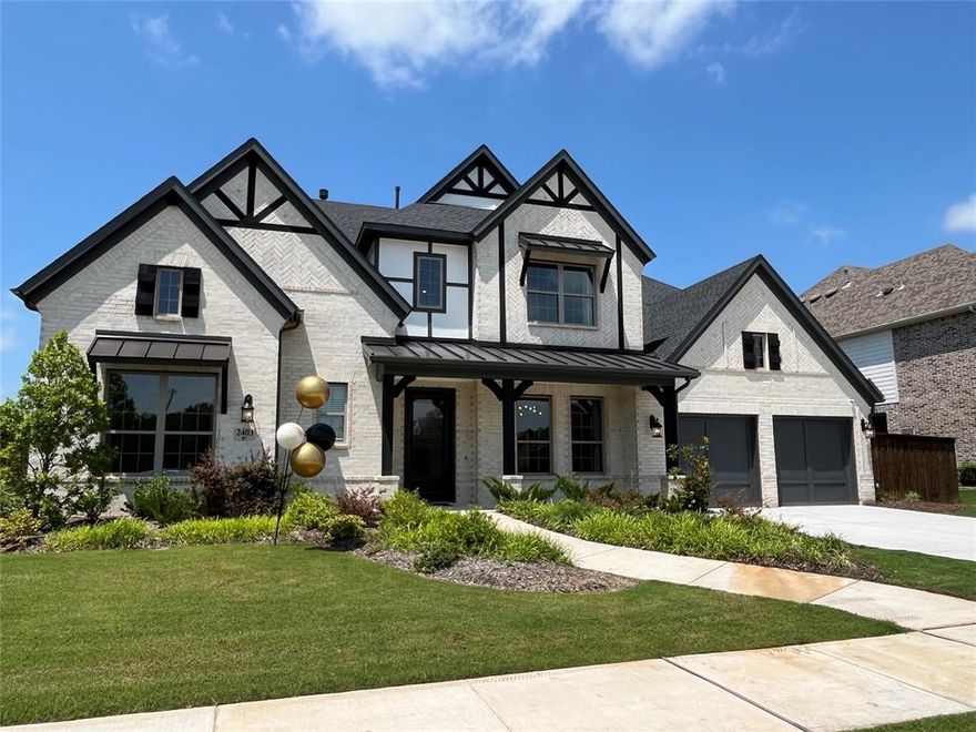 GREAT PRICE!  COVENTRY MODEL HOME - NEVER OCCUPIED!  Luxurious two-story home with 5 bedrooms, 4.5 baths, 3 living areas, 2 dining areas, an office and a media room!  Dramatic curves and ceilings show off this stunning home that is perfect to unwind after a long day or entertain on the weekends.  As you enter, you're drawn to the large wall of windows allowing natural light to shine throughout the living room, kitchen and breakfast area while gazing out to the yard and greenbelt.  Warm hardwood floors flow seamlessly throughout the first floor with dramatic tile floors in bathrooms and utility.  The gourmet kitchen features quartz countertops and a large island with farmer's sink and space for seating.  Stainless steel appliances with 5-burner gas cooktop and vent hood and a Butler's pantry with lit glass cabinets.  First floor primary suite with curved wall of windows overlooking backyard and spa like bathroom with a soaking tub, separate vanities and a large walk-in shower with bench, glass window and shower door and drying area.  Guest suite with private living room, bedroom and bathroom to enjoy an extended stay with friends or family.  A decorative wrought iron staircase takes you to the second floor where you will find a game room with pool table and media room to entertain your guests.  Two spare bedrooms and spare bathroom and a third spare bedroom with private bathroom up.  This home also features large covered patio with sink and built-in gas grill, full gutters, sprinkler system and a tankless water heater!