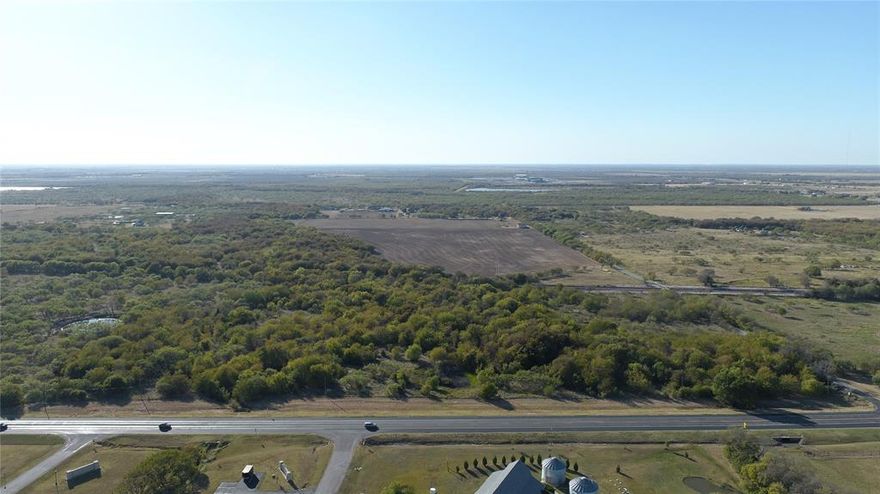 11 acres with commercial potential on Preston Road with approximately 740 feet of frontage on Hwy 289 , Preston Rd and approximately 700 feet of frontage on Reed Road.   11 acres of limitless possibilities, potential for commercial, Residential or a Multifamily community development.  Located in one of the fastest growing corridors in the state of Texas, small pond, creek, hardwood trees and a hard corner on 289.  Water available, 8 inch water line on north west side of Reed Rd and 289, confirmed thru Maverick Utilities, will require under Reed bore.  Take a drive a few minutes north of the middle of Gunter, this property is located inside the city limits.  Seller is Licensed Real Estate Agent. 
NOTE: BUYER IS RESPONSIBLE FOR CONFIRMING ALL DETAILS RELATED TO ZONING, ROAD EXTENSIONS, USAGE, UTILITIES, EASEMENTS, FLOOD PLAIN,  ETC.