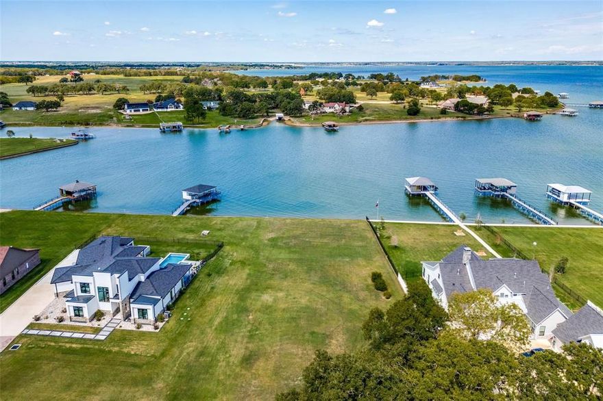 Great opportunity to own a premier 1-acre waterfront lot on Richland Chambers Lake, at a price point too good to pass up. Enjoy unobstructed lake views and direct access to boating, fishing, and water sports, with boat docks permitted for ultimate lake-life convenience. A durable steel seawall is already in place, protecting both the shoreline and your long-term investment, an upgrade that saves time and money from day one. Mature oak trees provide natural shade and a peaceful, private setting, while the lot places you directly across from a 10-acre farm with towering trees and wide-open skies, delivering breathtaking sunset views from the front and back that you’ll never get tired of. Located in the deed-restricted Vista Ridge subdivision, this property allows only site-built homes with a minimum of 2,000 sq. ft., ensuring quality and long-term value. Residents enjoy a private boat ramp, fishing pier, and well-maintained roads, and there’s no time limit to build, so you can plan at your own pace. With easy access to I-45 and a convenient drive to Corsicana, Dallas, and Waxahachie for shopping, dining, and essentials, this lot offers the perfect balance of tranquility and accessibility. Waterfront lots with this combination of views, protections, and amenities are limited—don’t miss your chance to secure it before it’s gone.