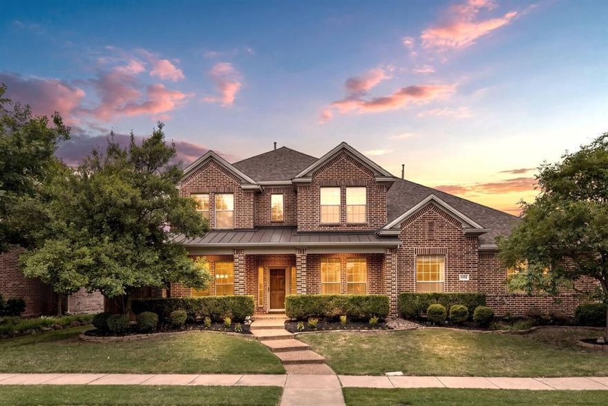 Welcome to luxury living at its finest in the heart of Stonebridge Ranch — one of McKinney's most sought-after master-planned communities. This stunning 5-bedroom, 4-bathroom home delivers the perfect blend of elegance, function, and lifestyle.
From the moment you arrive, the classic brick exterior, manicured landscaping, and covered front porch set the tone for everything inside. Hardwood floors flow through the main living areas, where a dedicated home office, a formal dining room with wainscoting, and a spacious family room with a dramatic floor-to-ceiling stacked stone fireplace and built-in cabinetry create an effortless entertaining experience.
The kitchen is a chef's dream, featuring rich wood cabinetry, granite countertops, stainless steel appliances, a gas range, and an abundance of storage — all opening to a bright breakfast area with views of the backyard. The primary suite is a true retreat, offering a spa-inspired bathroom with dual vanities, a freestanding soaking tub, a frameless glass walk-in shower with designer tile and matte black fixtures, and a dedicated vanity area. A thoughtfully placed downstairs guest bedroom and full bath provide the perfect accommodations for visitors or multi-generational living.
Upstairs, the entertainment continues with a sprawling game room complete with a bar, and custom cabinetry — plus a dedicated media room perfect for movie nights. Generously sized secondary bedrooms round out the upper level, each with room for the whole family to spread out.
Step outside to your own private oasis — a cedar-covered patio overlooks a lush, tree-lined backyard with room to play, all enclosed by a full privacy fence. The three-car garage boasts a mini-split HVAC system so you can utilize it for a workshop or storage. Walk to Bennett Elementary, Stonebridge Ranch Aquatic Center, scenic hike-and-bike trails, and neighborhood parks. This is the one you've been waiting for.