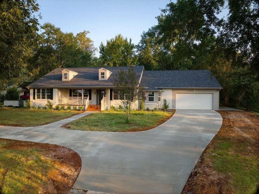 Fully renovated and ready to impress! Remodeled from top to bottom, this 4-bedroom, 2.5-bath home blends stylish design with quality upgrades throughout. A raised roof line adds ceiling height and enhances natural light, while the chef’s kitchen features quartz countertops, premium stainless steel appliances, and modern lighting. Major improvements include a new roof, HVAC system, windows, updated electrical and plumbing, and upgraded insulation for year-round comfort. A brand new concrete driveway adds even more curb appeal. Inside, enjoy spacious walk-in closets and a flexible bonus room off the garage—perfect for a home office or studio. The private, fenced backyard includes a covered patio, ideal for outdoor entertaining. All set in a desirable, well-established neighborhood. This stylish home is like new and ready for occupancy now!!