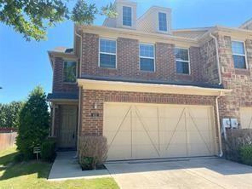 Immaculate End-Unit Townhome in Prime Lewisville Location!  Beautifully maintained and move-in ready, this stylish 2-story end-unit townhome is ideally situated just off Hwy 121 with quick access to I-35, major employers, shopping, dining, and entertainment! Enjoy a quiet community setting with resort-style amenities including a sparkling pool, park, and walking trails.  Step inside to find a bright, open layout—featuring rich wood floors throughout the first level, a spacious living room with a cozy fireplace and elegant mantle, and a gourmet kitchen with granite countertops, stainless steel appliances, espresso cabinets with upgraded hardware, and designer tile backsplash.  Upstairs offers a flexible layout perfect for today’s lifestyle, including a luxurious primary suite with dual sinks, designer tile accents, separate shower, and an oversized walk-in closet. The convenient second-floor utility room includes a washer and dryer—plus the refrigerator stays!  This home offers comfort, style, and unbeatable convenience. Easy access to DFW Airport, Legacy West, Grandscape, and major thoroughfares makes commuting a breeze. Owner will consider long-term leases (2+ years).