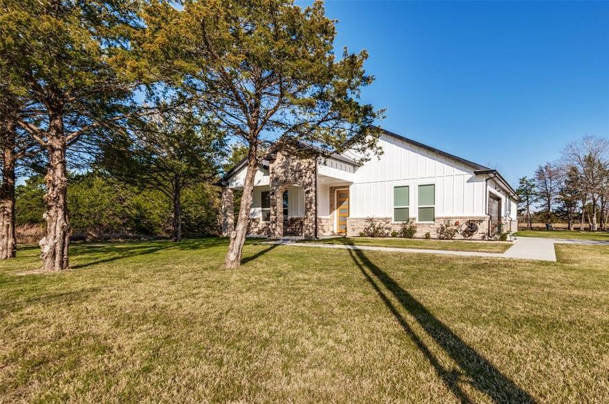 Discover this beautiful new construction home on .82 acre, perfectly located outside city limits, no HOA, offering the freedom and space. This modern home delivers the best of both worlds! Peaceful country living with a quick 10 min drive to dining, shopping, and Lake Tawakoni. Convenient access to Highways 34 and 276 makes commuting simple. Step inside to an inviting open floor plan featuring 4 BEDROOMS and 2 FULL BATHROOMS and 2 car garage. The home is filled with upgraded finishes, including quartz countertops, stainless steel appliances, wood flooring, a pot filler, and barn accents that add charm and style throughout. The spacious primary suite is a true highlight, with the luxurious primary bathroom includes a walk in shower, freestanding tub, dual sink vanities, and a large walk in closet. A standout feature of this home is the modern kitchen, complete with bold wood flooring and a matching herringbone backsplash, both stylish and functional. Don’t miss your chance to own this gorgeous new construction home near Lake Tawakoni. Enter open-floor plan kitchen, where coffee aromas fill the air, then step out into your private outdoor oasis, where the adventure begins. Mature trees and open grassy areas create the ideal setting for everything from backyard games to peaceful retreats in nature. This property’s expansive yard invites endless exploration. The house has everything ready for an RV, including electricity, water, and drainage. Follow a path through tall trees to a hidden corner, perfect for a hammock or reading spot. In the wide-open lawn, there’s ample room for family gatherings or even a tent for starlit camping. Imagine evenings gathered on the patio, roasting marshmallows over a fire pit, or lying on blankets as the stars blanket the sky. With space for a garden, climbing trees, or an outdoor play area, this home is perfect! Where you can indulge in the thrill of outdoor life without leaving your own backyard. Contact to schedule your showing today!