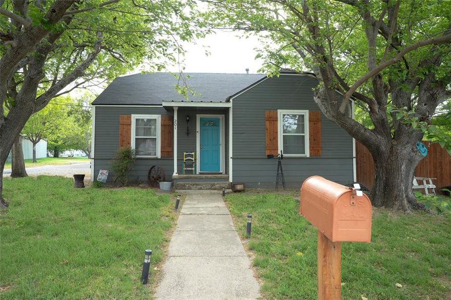 Welcome to this charming, updated home ideally located just moments from the heart of Decatur. Situated right off the square, this property offers unbeatable convenience to local dining, shopping, and year-round community events. 

This inviting 2- bedroom, 1-bath home blends timeless character with modern updates, features include refinished wood floors, neutral paint colors, and open floor plan. The thoughtfully renovated kitchen and bath include stylish finishes, neutral countertops, and updated tile work, while original details like crystal doorknobs add unique charm throughout. A versatile bonus room offers the perfect space for a home office, nursery, second living, or dressing room. Outside you’ll find ample parking with a two car carport, large private yard, and a storm cellar,  all situated on a spacious corner lot with mature trees.

Whether you are looking for a primary residence or an investment opportunity, this home offers the perfect combination of character, updates, and an unbeatable location near downtown.