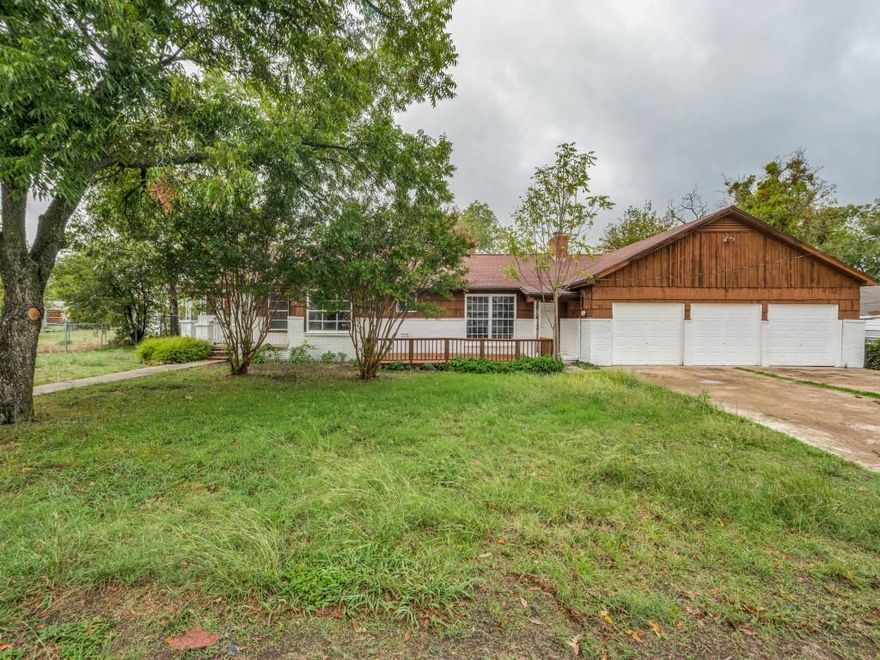 SO MANY POSSIBILITIES WITH THIS PROPERTY! This property is currently setup as a duplex with 2 bedrooms and 2 bathrooms on one side and 2 bedrooms and one bathroom on the other side. Both sides have fireplaces and full kitchens as well. The seller is also willing to open a wall back up to make it a single family 4 bedroom, 3 bathroom home as well. So many updates including stainless steel appliances, new butcher block countertops, new vanities, new countertops, fresh paint inside and out, custom tilework and MORE! Great value for the square footage in this one! This would make a great income producing property for an investor. Or buy it, live in one side and rent out the other side to reduce your mortgage payment. Don't miss out on this awesome property!