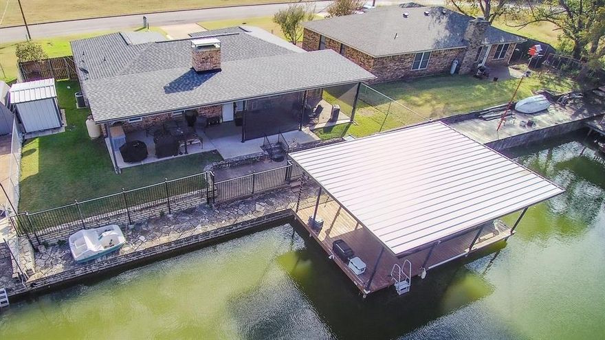 Searching for the best value in Granbury? You found it! This waterfront property just leveled up with some significant updates, including luxury vinyl plank flooring, modern fixtures, and fresh interior paint throughout, perfectly complementing the granite countertops in the kitchen and cozy gas log fireplace. Whether you’re hosting at the dry bar (easily convertible to a wet bar) or relaxing in the updated primary ensuite, comfort is a given.

Beyond the aesthetics, the bones of this home are top-tier: a 2025 roof, 3-ton Trane AC, a 40-gallon Rheem water heater and energy-efficient windows. The outdoor living space is purpose-built for the fisherman and the entertainer alike, featuring a fish cleaning station, a private dock with a lift, and a covered patio for sunset watching. This is a rare opportunity to own a refreshed, energy-efficient waterfront home at an unbeatable price point.