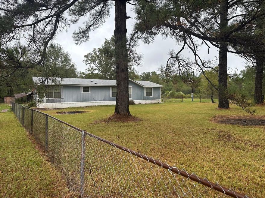 Very Well kept older Model Doublewide sitting on 16.5 Acres in Princeton.  The home has 3 bedrooms with 2 baths.  Large living area with a open floor plan.  The home could be very easily updated or sold! There is a small pond on the property but is dry!