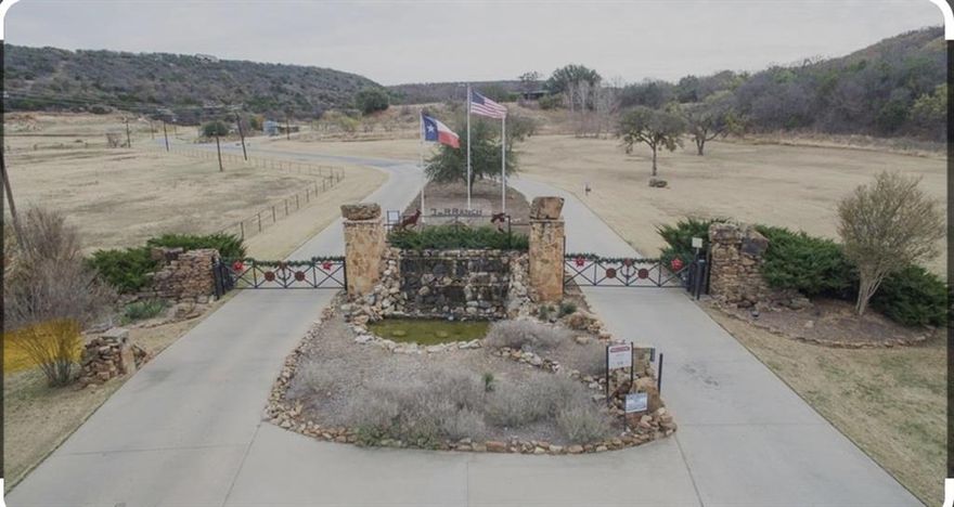 Discover a stunning 2.08-acre lot at the corner of Arts Way and Canvasback, overlooking the picturesque Lake McClintire, located within the prestigious 7R Ranch and Sundance Club community. This exclusive area seamlessly blends luxury and leisure, perfect for those seeking a serene escape.
Wake up to breathtaking views of Clayton Mountain and the tranquil lake, surrounded by nature’s beauty and countless activities designed for your enjoyment. Whether you’re an adventure seeker or simply looking to unwind, Sundance Club features amenities like swimming pools, fishing spots, hiking and biking trails, and stargazing areas.Explore a range of activities at your pace: pickleball, horseback riding, e-biking and yoga!  For competition enthusiasts, there are basketball, volleyball, and various sports facilities for friendly matches.Entertainment flourishes here, with a state-of-the-art movie theater, live concerts, and festive holiday celebrations that strengthen community bonds. Sports fans will love dedicated screenings of Cowboys, Rangers, Mavericks, and Stars games, ensuring every game day is memorable.Sundance Club is more than just a community; it’s a lifestyle where every need is catered to, from recreational activities to spa experiences. This 2.08-acre lot is your chance to call this extraordinary place home.
Don’t miss the opportunity to invest in luxury, excitement, and tranquility—come explore the endless possibilities at Sundance Club today!