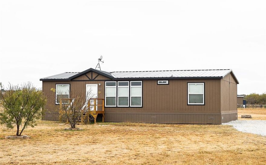 Discover country living on 2.29 acres with this well maintained 2021 built manufactured home. Featuring a brand new metal roof, this property offers long lasting durability and low maintenance.  
Inside, you will find an open floor plan, natural light, comfortable living space, and plenty of acreage waiting for you to make it your own!