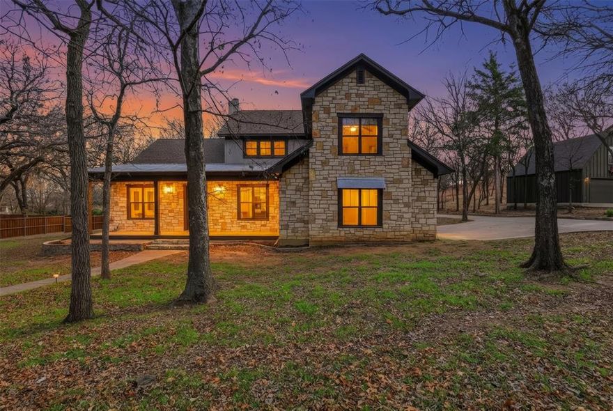 Nestled on approximately .75 of an acre just minutes from Lake Weatherford, only five minutes to H-E-B, 15 minutes to downtown Weatherford, and just 35 minutes to downtown Fort Worth, this oak-covered property offers the perfect blend of privacy and convenience. The wrought-iron fenced backyard opens space for natural scenery to flood into your home. A sparkling pool, cozy fire pit, and even an axe-throwing area give you and outdoor living space to double the usability of this property. Beyond the fence, wide-open green space invites frequent visits from roaming deer. The primary suite is located on the main level and includes a spa-style ensuite with a separate shower and soaking tub, dual water closets, and a large walk-in closet. Hardwood floors and striking custom trim highlight the office, formal dining, and main living areas, while a convenient half bath near the back door makes poolside entertaining easy. The kitchen offers abundant cabinetry and counter space with views stretching deep into the backyard—perfect for keeping an eye on outdoor activity. Upstairs, you’ll find spacious bedrooms with walk-in closets, including a private bedroom and full bath ideal for guests, a mother-in-law, or a college student, plus a large game room that works beautifully as a media space, home gym, or hobby area and easily fits a pool table. This exceptional home delivers space, style, and an unbeatable setting—and is priced to sell fast.