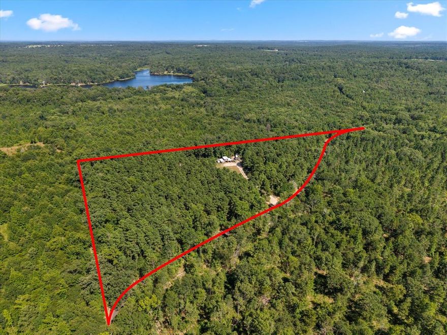 Escape to the peace and privacy of East Texas with this scenic 10.5-acre off-grid property just minutes from Winnsboro. Thoughtfully set up for sustainable living, the land includes a premium solar power system with an EG4 6000XP inverter, EG4 all-weather battery, and eight 450W solar panels—providing efficient, independent energy for your future build or getaway. A solid 25x36 barn offers versatile space for equipment, livestock, or workshop use. The acreage features a mix of open areas and scattered trees, making it ideal for hunting, recreation, gardening, or simply enjoying the outdoors. Whether you're dreaming of a private homestead, weekend retreat, or investment in off-grid living, this property is full of opportunity and ready for your vision.