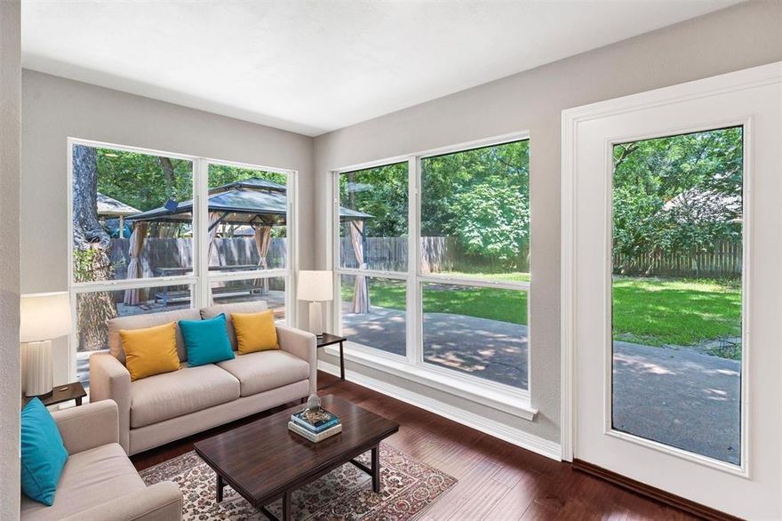 Motivated Seller! The sellers purchased another property and currently have two mortgages.  At $168 per sq ft the list price is well below the current market. This beautifully updated 3-2-2.5 home is located in one of the most sought-after neighborhoods in the area. Step inside to discover a spacious, open floor plan featuring abundant natural light, high ceilings, stunning wood floors and a cozy wood fireplace as the heart of the living area.  This recently updated home features sleek finishes and modern fixtures throughout. New stainless-steel appliances were added in 2025. The large primary suite boasts a built-in bookshelf, luxurious garden tub with jets, perfect for unwinding, as well as a walk-in closet for ample storage. Two additional well-sized bedrooms provide plenty of space for family or guests. There is a large sunroom with abundant windows and a separate room for dining, an office or entertaining.

Enjoy the large backyard under the shade of multiple mature pecan trees or relax on the expansive patio with a charming gazebo. Gather around the fire pit and create lasting memories with friends and family. The home features a circle driveway with over-sized parking for multiple vehicles, as well as a dedicated RV-boat parking pad for added convenience. The 2.5 car garage provides plenty of storage and workspace. The attic also has plenty of extra storage.  With its perfect combination of interior elegance and outdoor charm, this home is sure to impress. Don't miss your chance to own this gem in a coveted neighborhood!