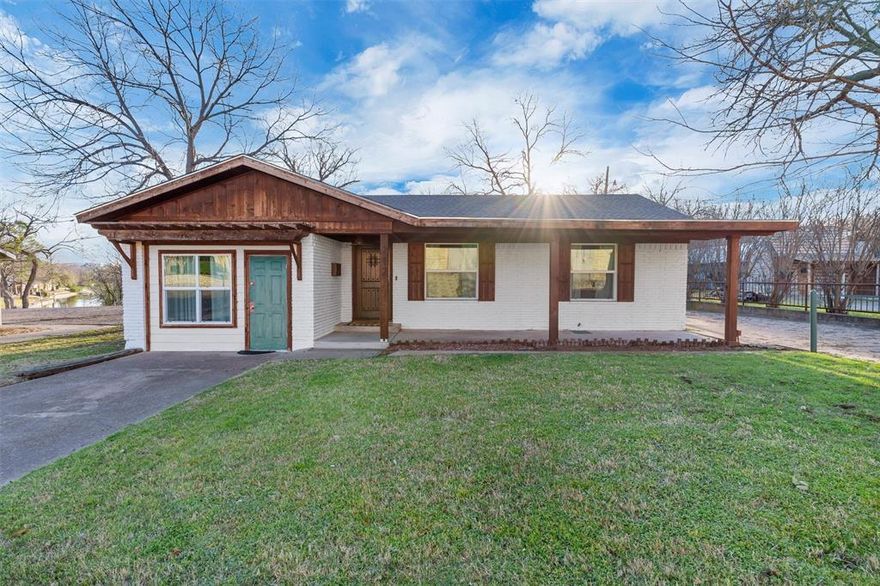 MASSIVE Opportunity to own one of the closest physical houses to the historic Granbury Square. This wonderfully updated property is zoned light commercial and is currently the home of a short-term rental (Air-BnB) business. Guests absolutely love this 3 bed, 2 bath home with plenty of parking for a large group! The home boasts a step-down master suite with its own entrance, fully remodeled bathrooms, remodeled kitchen with beautiful countertops and a brass sink, an open living and dining room, a large back porch with a waterfront view, a storage shed and a fenced-in back yard with grass turf! This property is amazing for hosting guests, having parties, or even enjoying for yourself on special occasions. The property does have a current property manager that is willing to continue with the new owners. With the property being zoned light commercial, the possibilities are many including an office! This is a rare and unique property that you are not going to want to miss!