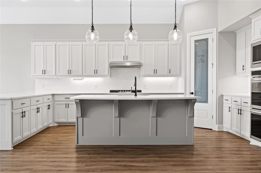 This amazing ONE STORY located in the thriving MASTER PLANNED COMMUNITY OF SONOMA VERDE offers CUSTOM FEATURES throughout, something you won't find anywhere else. Enter into the home to discover an OPEN CONCEPT design with GOURMET KITCHEN offering double ovens, TWO QUARTZ ISLANDS, gas cooktop and custom pantry door, overlooking expansive family room with gas log fireplace and luxury vinyl plank flooring. Primary bedroom with updated ceiling fan, fresh new carpet and ensuite offering high-end GRANITE countertops, dual sinks with vanity space and large walk-in closet. Three additional secondary bedrooms, hall bath with TAJ MAHAL QUARTZ countertops; one bedroom offers PRIVATE ENSUITE FULL BATH. GREENBELT LOT offers privacy to enjoy quiet evenings on the covered patio. Sonoma Verde offers community pool, sand volleyball, walking trails, fishing pond and so much more! A full list of upgrades seller has made since ownership of the home is available.  This home is PRICED TO SELL and ready for new owners to call home. Come see it today!