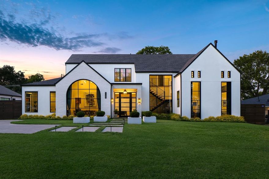 Welcome to this pristine newer construction home in the desirable Eudora Estates neighborhood, with custom details and bright, inviting spaces with a seamless floor plan and ideally located near Central Market, Northaven Gardens, and a few short blocks to the Northaven Trail. A dramatic oversized glass entry door sets the tone as you step inside, where an airy foyer and striking architectural staircase make a lasting impression. To the left, the elegant formal dining room offers a sophisticated space for gatherings, while straight ahead, the expansive great room serves as the true heart of the home. Anchored by a marble-surround gas fireplace and warm white oak flooring, the great room is flooded with natural light and opens seamlessly to the gourmet kitchen. The kitchen features dual dishwashers, a commercial-grade gas range, paneled breakfast area, and custom cabinetry. A spacious walk-in pantry and laundry room are tucked away behind the kitchen with direct access to the backyard and pool. The primary suite is a private sanctuary, offering a large bedroom retreat, spa-inspired bath with separate soaking tub and shower, and an oversized walk-in closet. A versatile second living area downstairs—complete with fireplace and wet bar—can serve as a lounge, library, or media space, while a front guest suite with private bath and walk-in closet ensures comfort for visitors. Upstairs, three additional bedroom suites and a generous game room provide ample space for family and friends. Outside, the private backyard is fully turfed for low-maintenance living and centers around a sparkling pool, covered patio, and outdoor living area perfect for year-round enjoyment. The oversized three-car garage includes two electric vehicle chargers and space for lifts, enhancing both convenience and storage. Move-in ready and beautifully appointed, this exceptional home offers contemporary luxury, a thoughtful floor plan, and every detail designed to welcome you home.