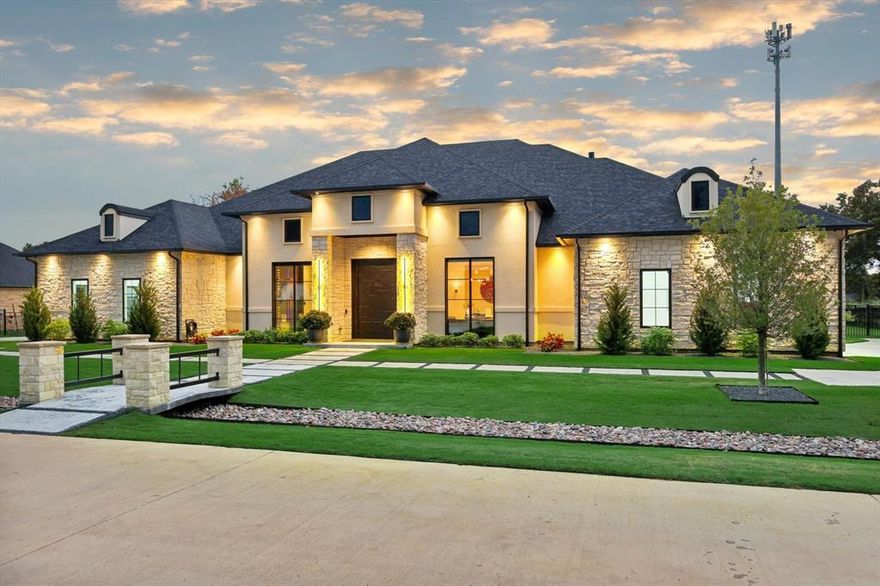 Nestled in a tranquil, GATED community, this exquisite PROFESSIONALLY DESIGNED ONE STORY home sprawls across a nearly ONE ACRE homesite, masterfully balancing grandeur with comfort. This home will be cherished by someone who only wants the BEST OF THE BEST in life! Across its elegant 5500 sq ft floorplan are 4 spacious bedrooms all with ENSUITE bathrooms plus two half baths, ensuring the utmost privacy and convenience for residents and guests alike. This home also boasts TWO DEDICATED HOME OFFICES along with TWO LAUNDRY rooms. Protect and display your wine collection with a 300 bottle climate controlled WINE ROOM viewed through a 10 ft wall of glass! The kitchen features ALL WOLF & SUBZERO appliances: a 60 inch dual fuel range with two ovens, a steam oven, a full size wine fridge, built in full size fridge and freezer, undercounter fridge & freezer convenience drawers PLUS a built-in coffee maker—all framed by the HIGHEST LEVEL OF CUSTOM CABINETRY. 'His and Hers' twin 2 car garages offers ample space for vehicles & storage (4 CAR TOTAL GARAGE space!) includes 50amp plugs for electric vehicle charging. EXERCISE ROOM! Opening the GLASS WALL OF DOORS to the backyard doubles the size of the living space with a 43x20 covered patio with MOTORIZED SHADE SCREEN. There will be no smoke on this patio with a 42in HESTON VENTAHOOD over the Heston 36in GRILL & cold drinks for everyone with the HESTON ICE MAKER & FRIDGE. HEATED & CHILLED SWIMMING POOL & ZEN LIKE SPA invite relaxation year round, while 4 GAS FIREPLACES create a cozy ambiance. Texas sized backyard with tons of grassy areas! $250k CONTROL 4 FULL HOME AUTOMATION & AUDIO SYSTEM with SPEAKERS IN EVERY ROOM including the garages & backyard! Dolby Atmos full surround sound in family room! 12 security cameras, full security alarm. FOAM INSULATION, even in garages! Each corner of this dwelling reflects professional design and highest-quality craftsmanship! Floor to ceiling STEEL WINDOWS with MOTORIZED SHADES.