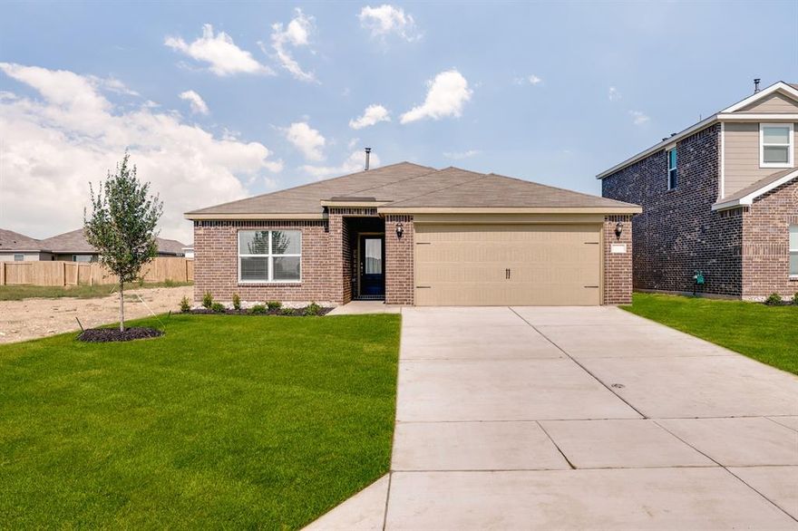 The Ashton is a beautifully designed one-story home featuring three bedrooms, two bathrooms, and a charming brick exterior with a welcoming covered porch. Inside, the open-concept layout seamlessly connects the kitchen, dining, and family rooms, perfect for everyday living and entertaining. The attached two-car garage provides convenience and protection from the elements, while also offering extra storage space. With spacious bedrooms and a thoughtfully designed layout, this home blends elegance, comfort and functionality for the perfect living experience.