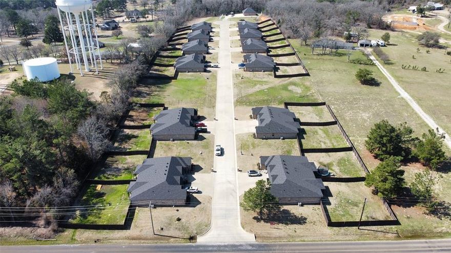GREAT INVESTMENT OPPORTUNITY!! 12 upscale duplexes (24 units) on 10 acres in a serene country setting just minutes from everything that South Tyler has to offer! This property includes a 48x48 metal workshop on a slab, concrete drive culdesac (one way in and out), 10 acres of land and 24 units with approx 1450 sq ft, 3 bedrooms, 2 bathrooms and 2-car garage. Conveniently located near Tyler Athletic & Swim Club, Grande and HWY 49 with easy access to everything that S. Tyler has to offer and Jack, 3 Lakes, Legacy schools (per TISD website)! Featuring solid countertops, beautiful cabinetry, tile flooring throughout, tray ceilings, can lighting, ceiling fans, blinds, large walk in closets, utility room, wired for security system and covered patio.