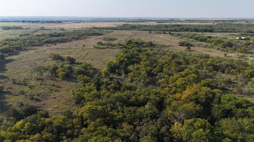 OWNER FINANCING POSSIBLE!!! ONLY 13 MILES FROM REDNECKS WITH PAYCHECKS AND RED RIVER STATION!!! Ideal location for a Homesite, weekend hunting getaway, RV Park or Tiny Home Community.
From 20-55 acres of raw land with 1400 ft of Hwy 82 frontage. Anything from 20-55 acres can be purchased. Property has electricity available and is currently leased for hunting. The opportunities for this property are plenty! Come build your Country Home, or it could be used for Commercial use as well like an RV Park or Self Storage Units with over 1400 ft of Hwy 82 frontage!!!. It has 1 pond on it and plenty of room for grazing and or hunting, etc. With 20-55 acres you have plenty of room to build a home well away from the Hwy. Close to Nocona, Henrietta, and Wichita Falls, it is easy access for all of your needs!!
5 miles to Nocona home of Nocona Boots & Baseball Gloves, Saint Jo home of Arche & Blue Ostrich Winery & Vineyards and RedNecks with PayChecks Fall Mudcrawl, 25 miles to Muenster know for its German-American Heritage; Germanfest, Fischer Meat Market.