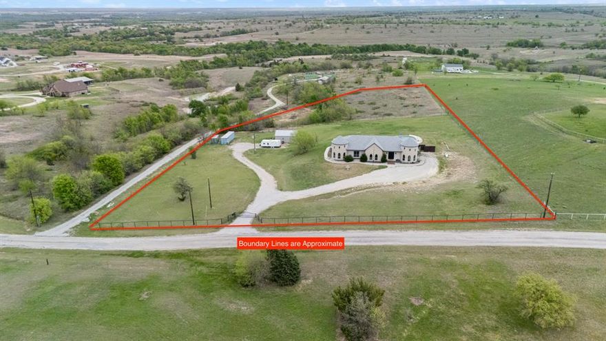 *LISTED UNDER APPRAISED VALUE*  Situated on 5 peaceful acres, this 1 story home offers 4 bedrooms, 2 half-bathrooms and 3,700 square feet of living space. Step inside to an open floor plan featuring stained concrete floors, vaulted ceilings, custom finishes, and a scenic view. The living room, featuring tall ceilings and grand fireplace, leads into the kitchen with complete with a 6 burner gas cooktop with griddle, pot filler, and beverage fridge. The primary ensuite is definitely an escape, with a large jetted tub, and over-sized walk in shower with 4 shower heads and 5 body sprays! The primary closet also includes a laundry space and access to one of the towers, currently used as an office. 

Across the house is another family room with direct access to the back porch. All 3 secondary bedrooms have their own private bathrooms and walk in closets. The 2nd tower on this side is currently used as a play room. Neither tower is included in the overall square footage! 

Step outside to enjoy the pool, large back patio, wide open skies, and the quiet of the surrounding countryside. The property also features a storm shelter and workshop complete with its own bathroom and a separate spare room—ideal for and office, guests, hobbies, or extra workspace.

If you’ve been looking for something truly special with room to spread out, this one-of-a-kind property delivers.