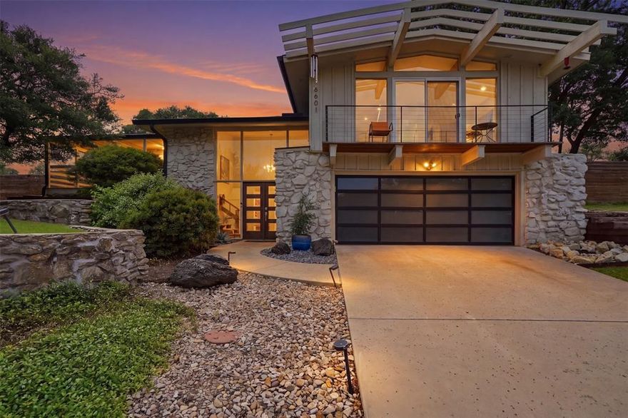 Nestled in the highly desirable Ridgmar neighborhood of Fort Worth, this stunning residence blends timeless mid-century modern flair with sleek contemporary design. Perched on an elevated corner lot, the home offers exceptional privacy along with expansive wide-reaching views rarely found in the area. Expansive floor-to-ceiling windows create a dramatic first impression while filling the home with ample natural light. Inside the house, clean modern finishes and sophisticated design define the beautifully updated kitchen and living spaces. The kitchen features sleek cabinetry, waterfall-style island, stainless appliances, and an open, functional layout ideal for entertaining. The interior material palette along with the statement stone walls give the home warmth and character. The thoughtfully designed split-level floor plan offers privacy, while the oversized primary suite serves as a true retreat complete with a private walk-out patio perfect for relaxing mornings or quiet evenings. Both bathrooms have been beautifully renovated and feature dual vanities, tile flooring, quartz countertops and updated fixtures. Two spacious living areas provide flexibility for entertaining, relaxing, or working from home. Multiple outdoor living areas seamlessly extend the home’s entertaining space, creating an effortless indoor-outdoor flow and feature one of the most impressive red oak trees in the vicinity. A cozy wood-burning fireplace adds warmth and ambience, making the dining experience feel intimate and inviting.  Conveniently located just minutes from major highways, the home offers quick access to downtown Fort Worth, the Cultural District, and the Medical District while still maintaining a peaceful residential setting.