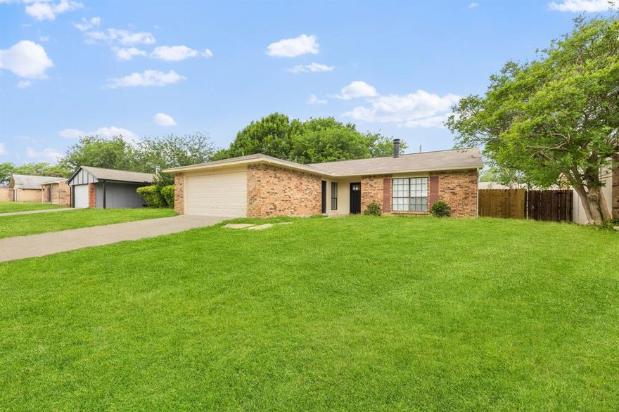 This is the kind of home that checks the boxes: updated, manageable, well-located, and full of potential to grow into.

Looking for your first home and want something that actually feels right the moment you walk in? This one is worth a closer look.
Tucked into an established Arlington neighborhood, this home offers that sense of ease people are always hoping to find… where things feel relaxed without giving up convenience.

Inside, you'll discover 3 bedrooms and 2 full bathrooms, with updates already done so you’re not starting from scratch. The finishes are modern: updated flooring, fresh paint, fencing, and stained cabinetry that adds warmth and character. It’s the kind of space where you can move in comfortably and then make it your own over time.

Your centerpiece is thet floor-to-ceiling brick fireplace. It anchors the living space in a way that instantly makes the home feel inviting. It's perfect for slow evenings in or hosting a few friends without trying too hard.

The layout is practical, easy to live in, and sized just right for someone stepping into ownership.

Then there's the location, which is a big part of why people choose Arlington in the first place. You’re minutes from everything that makes the area fun, like catching a game or event near AT&T Stadium or spending a day out around Globe Life Field. You’re close enough to enjoy it all… without feeling like you’re in the middle of it.  That balance is hard to find.