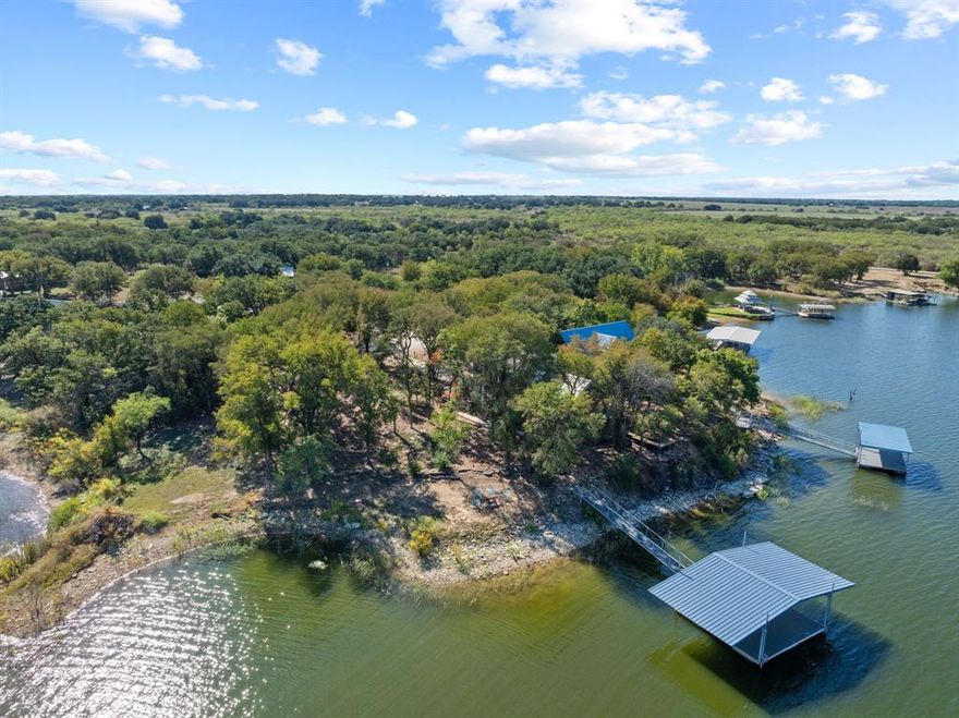Imagine waking up to lake views, mornings on the dock, and evenings watching the sunset over Lake Leon. This move-in-ready lake home is ready to enjoy today, with plenty of opportunity to add your own style and build future equity over time.With water views from almost every room, the two-story layout offers a spacious primary suite and guest suite on the main level, four additional bedrooms, full bath, and flex space for a game room or second living area. Step outside to your private dock and elevated viewing deck for the full lake life experience.Perfect as a full-time home, weekend retreat, or investment property, with proven short-term rental income including a month generating over $10,000. Enjoy it now, personalize it later, and make it your dream lake house.