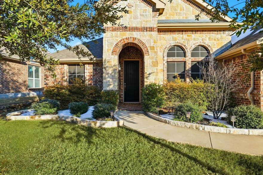 Welcome to this beautifully maintained one-story home in the desirable Steeplechase North addition. Featuring 4 spacious bedrooms, 2 full baths, plus a dedicated office, this thoughtfully designed layout offers both comfort and functionality. The west-facing orientation fills the home with natural light, creating a warm and inviting atmosphere.The upgraded primary bath showcases modern finishes and a spa-like feel, while custom interior details—including designer paint selections and elegant wainscoting—add character and charm throughout the home. Generous living spaces make this home ideal for both everyday living and entertaining.  Enjoy the community pool, close proximity to Lake Lewisville, the marina, and the airport, offering convenience for recreation and commuting alike. This move-in-ready home blends style, location, and practicality in one exceptional package.