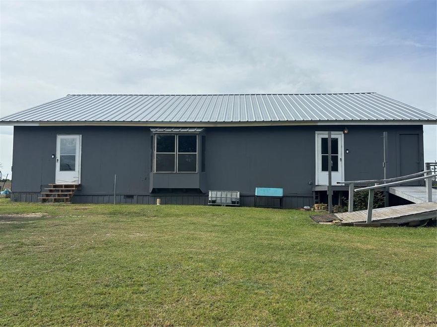 Tucked away on nearly 3 acres, this unique property offers space, privacy, and incredible potential. The 3 bedroom and 2 bath home features over 2,100 square feet, providing a solid foundation for someone ready to make it their own. Major improvements have already been completed, including foundation leveling and a brand-new roof, giving peace of mind on the big-ticket items. Inside, the home offers a spacious layout with an upstairs loft that’s ready to be finished out—perfect for adding additional living space, a game room, or a private retreat. While some interior updates remain, the opportunity to customize and add value is undeniable. Outside is where this property truly shines. An extensive amount of work has gone into clearing and improving the land, transforming what was once an overgrown space into a usable, open setting with endless possibilities. Whether you’re dreaming of a workshop, animals, gardening, or simply enjoying wide-open Texas skies, this property is ready. If you’re looking for acreage, major structural updates already completed, and room to create your vision, this one is full of potential and priced to reflect the opportunity. PROPERTY SOLD AS-IS