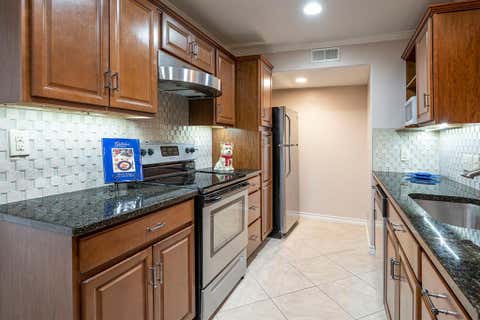 Photo of 10757 Villager Road #B, Dallas, TX 75230 (MLS # 21342132)
