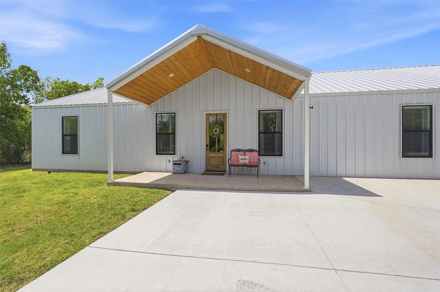 If you’ve been searching for a true Texas barndominium with land, space, and privacy—this one delivers.

Situated on approximately 3 acres just outside the city limits, this stunning 4-bedroom, 2-bath home offers the perfect balance of peaceful country living and convenient access to town. Located just minutes from downtown Denison, shopping, dining, and everyday essentials, you’re never far from what you need while still enjoying wide-open space.

Inside, the home features an open-concept layout with soaring cathedral ceilings, creating a bright, expansive feel that immediately stands out. The living, kitchen, and dining areas flow seamlessly—ideal for both everyday living and entertaining.

Step outside and enjoy a beautifully maintained 3-acre tract with mature trees and a great yard, offering plenty of room to spread out, add improvements, or simply enjoy the quiet setting. Whether it’s relaxing under the trees or hosting gatherings, this property gives you the flexibility that’s hard to find.

The primary suite includes dual closets for ample storage, and the converted garage easily accommodates up to four vehicles—perfect for trucks, equipment, or a workshop setup.

Zoned to Denison Independent School District.

Properties like this—combining acreage, privacy, and a move-in-ready barndominium in a growing North Texas corridor—don’t come around often.

Schedule your showing and see it for yourself.