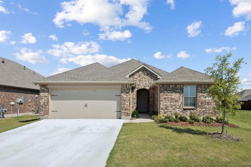 This beautifully designed one-story home effortlessly blends style, comfort, and functionality. With its open-concept layout and abundant natural light, the space feels airy, warm, and welcoming from the moment you walk in.
Situated in the highly sought-after Elavon community in Lavon, TX, this home is surrounded by manicured green spaces, friendly neighbors, and first-class amenities—including a resort-style pool, parks, and sports courts.
From the curb, the full-brick exterior delivers timeless appeal and enduring quality. Inside, the spacious living room features large windows overlooking the lush backyard, enhanced by custom wood shutters that add a touch of elegance and privacy. It flows seamlessly into the dining area and a chef-inspired kitchen showcasing marble countertops, a generous center island with seating, stainless steel appliances, a gas cooktop, and plenty of cabinetry for all your storage needs.
The private primary suite is a peaceful retreat designed for relaxation, featuring a spa-like bath with a large walk-in shower, dual vanities, and an oversized walk-in closet you truly have to see to believe.
Three additional, well-sized bedrooms offer comfort and flexibility—perfect for family, guests, or a home office.
Step outside to a fully landscaped backyard with lush green grass—ideal for entertaining, playtime, or simply enjoying the outdoors.
Every inch of this home has been thoughtfully styled and meticulously maintained—truly move-in ready. Don’t miss the chance to live in a vibrant community with top-tier amenities and small-town charm, just a short drive from city conveniences.