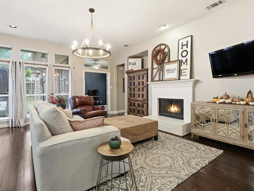 Beautiful single-story home in the heart of Stonebridge Ranch. This well-maintained property features an open floor plan with formal living and dining areas, rich wood floors throughout, and a bright study with French doors that can serve as a fourth bedroom. The inviting living room offers a painted white brick fireplace as a focal point, while the kitchen boasts updated appliances and plenty of counter space. The primary suite is a true retreat with a fully updated, spa-like bathroom. Enjoy all that Stonebridge Ranch has to offer, including the Beach Club, Aquatic Center, tennis courts, walking and biking trails, and peaceful catch-and-release ponds. Conveniently located near top-rated schools, shopping, dining, and major highways, this home combines style, comfort, and location in one exceptional package.