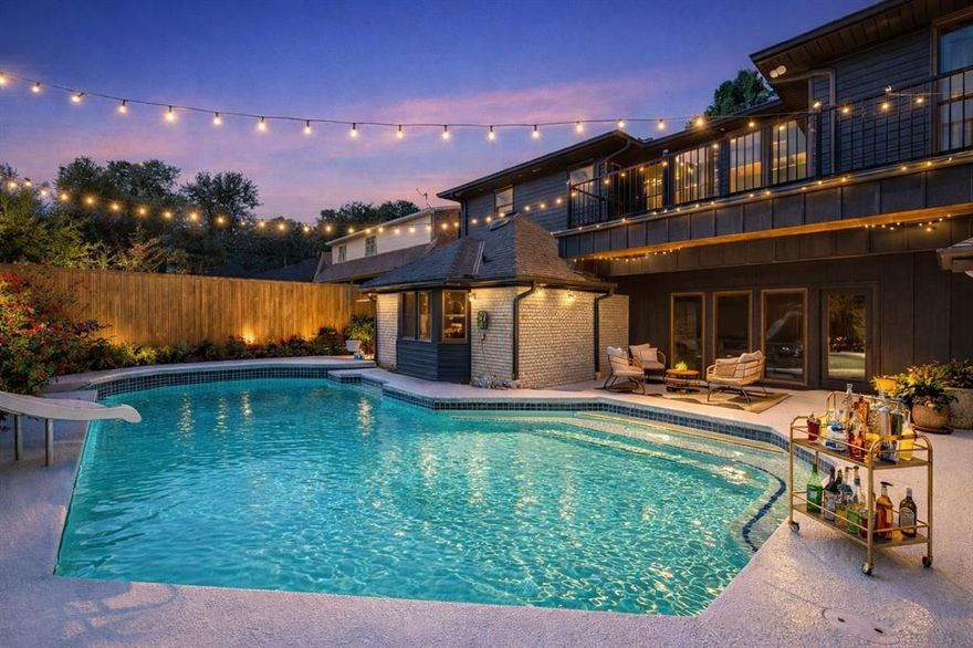 Stunning, fully updated modern masterpiece in sought-after Merriman Park, Lake Highlands. This 6-bedroom showstopper blends designer style with luxurious living—featuring a resort-style pool, media room, game room, and custom finishes throughout.

Step through the striking steel and glass entry into soaring vaulted spaces with real hardwood floors, fresh finishes, and a custom staircase. The gourmet kitchen offers an oversized stone island, floor-to-ceiling woodgrain cabinetry, high-end stainless Italian appliances, gas range, breakfast nook, and large pantry.

The primary suite is a serene retreat with a spa-like bath—circular soaking tub, glass shower, sauna, Japanese bidet, custom built-ins—and a closet the size of a bedroom. Three additional bedrooms downstairs provide flexible living options.

Upstairs includes a spacious game room with a built-in kitchenette, media room with patio access, plus three more bedrooms and a media room. The upstairs patio overlooks the pool and adjacent greenbelt with scenic trails.

An oversized three-car garage and exceptional upgrades make this a rare opportunity in one of Dallas’s most desirable neighborhoods. Agents and buyers to verify all information.