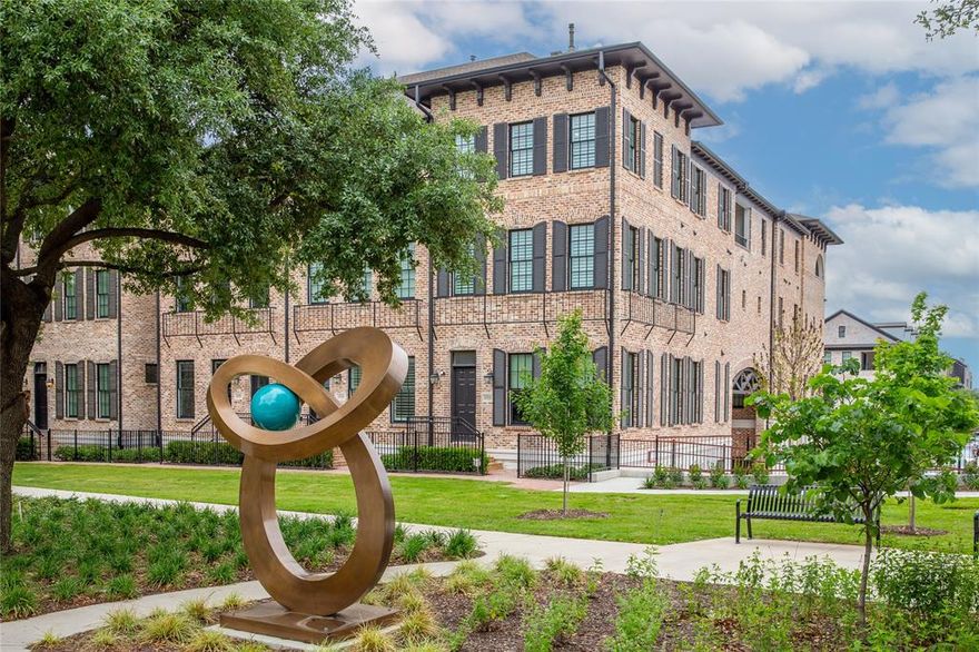 Don't miss out on this beautiful home!!! 4 story townhome with low HOA. Walk out your front door to Addison Grove's largest park or IMAGINE HAVING   COFFEE ON YOUR ROOF TOP BALCONY looking at the breathtaking view of The Grove's Park! The latest in an open-concept design with soaring 12' ceilings, all wood floors, and lots of large Anderson windows for the maximum in natural sunlight. 2nd floor opens up to a large gourmet kitchen with Bosch appliances, double stacked soft close cabinets and beautiful quartz countertops. The third floor opens to a spacious master retreat with OVERSIZED walk-in closet, Spa Bath with an walk-in shower. The entire 3rd floor is a master retreat! 4TH floor is game room and covered roof deck!! Hardwood flooring and high-end designer finishes throughout. URBAN LIVING at it's finest!