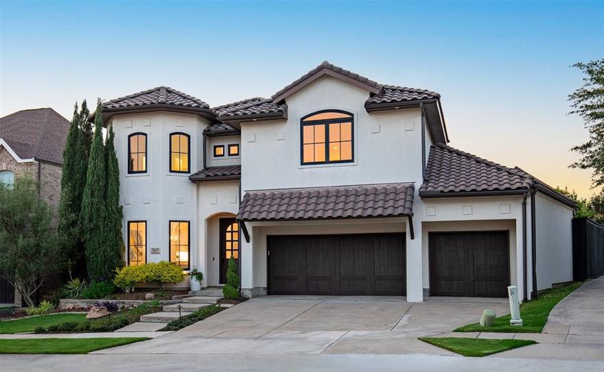 An exceptional Toll Brothers residence showcasing a striking transitional Mediterranean design in the heart of Plano. This one-owner home offers approximately 3,780 sf of refined living space, perfectly positioned on desirable oversized lot. Upon entry, enjoy the two-story entryway with new brass chandelier. The elegant formal dining room features curved windows and a designer grass cloth wallpaper ceiling with new brass chandelier. The living room is anchored by a striking stone gas fireplace, complemented by statement Restoration Hardware fixture. Remodeled kitchen is a showpiece, outfitted with white quartz countertops, custom white cabinetry with upper and lower lighting, and premium appliances including a Miele gas cooktop, GE Profile dishwasher, KitchenAid built-in refrigerator, wine fridge, and microwave-oven combo. Butler’s pantry seamlessly connects the kitchen to the dining area, along with a spacious walk-in pantry. Downstairs primary suite is complete with a tray ceiling and lovely remodeled spa-inspired bath featuring a freestanding tub, walk-in shower, dual vanities, and an expansive walk-in closet. Additional highlights include office, remodeled powder bath and laundry room, upstairs media and game room, 3 secondary bedrooms with 2 remodeled baths, spacious 3-car garage, plus upgrades such as solid core doors, Renewal by Andersen black windows, and updated designer lighting. Step outside to your private oasis featuring a freeform saltwater pool and spa with bubblers and a jump ledge, a covered patio, lush landscaping and yard. The private backyard also includes French drains, and gated pool equipment area. Major systems include 50-year concrete tile roof, 2 Trane multi-stage HVAC systems, and oversized gutters. Home has been refreshed inside and painted outside. Timeless architecture with modern upgrades, offering luxury, functionality, and exceptional indoor-outdoor living in one of Plano’s most desirable locations.