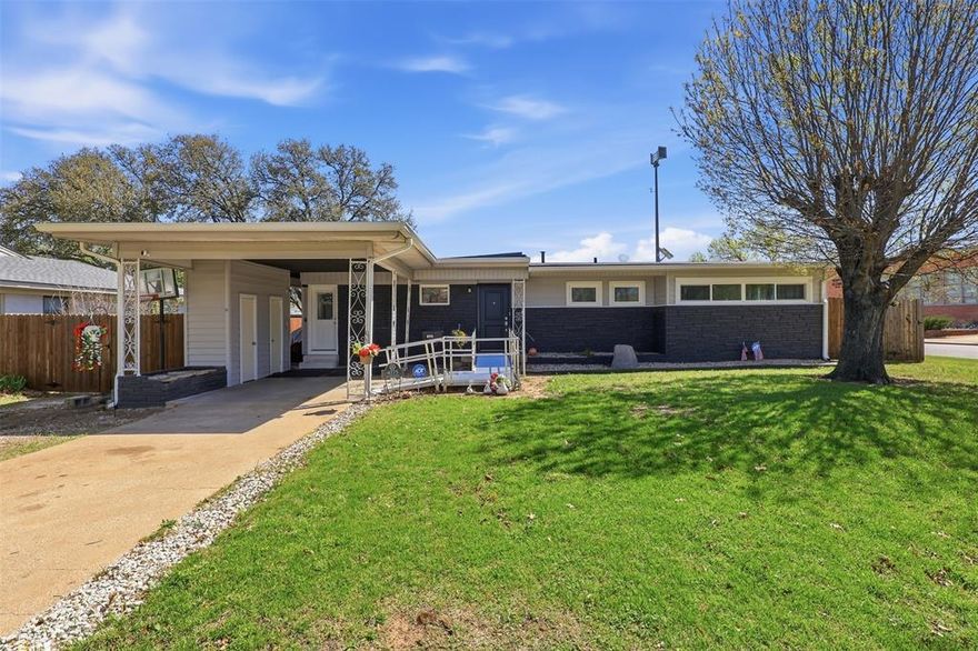 Spacious and full of versatility, this unique Fort Worth property is perfectly suited for multi-generational living or those seeking flexible space. Located on a desirable corner lot directly across from a community park & elementary school, the home offers an open living and dining area that can easily accommodate two eating spaces or multiple sitting areas—ideal for both everyday living and entertaining. The large kitchen is a standout feature, complete with a huge breakfast bar, granite countertops, built-in cabinetry, and double ovens, providing ample space for cooking and gathering. This home features 5 bedrooms plus a flex space that includes its own half bathroom, offering endless possibilities for a home office, playroom, or guest area. There are two primary suites, including a secondary primary retreat added to the rear of the home and accessed through the utility room. This private suite includes a jacuzzi tub and a comfortable sitting area, creating a true retreat within the home. The fifth bedroom includes a full-size closet and is currently being used as a game room, situated next to rear bedroom. Additional highlights include a large utility room with space for fridge or freezer and a separate storage area attached to the rear of the home. Enjoy outdoor living with an above-ground pool, perfect for relaxing or entertaining. This one-of-a-kind property offers space, functionality, and thoughtful updates in a prime location. Recent updates include: gutters, new siding, furnace, HVAC condenser, new windows, exterior doors, exterior paint, new roof, new fence, updated plumbing under home (new water line & pipe); insulation in attic, new ductwork, new electrical wiring. Buyer & Buyers agent to confirm schools, sq ft, dimensions, age, etc. Info deemed reliable but not guaranteed.