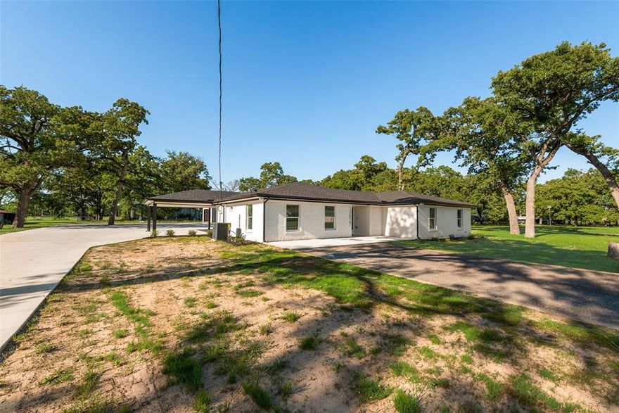 Stylish with complete update on country home. 4 bedroom, 3 bath on 1.13 acre with separate metal building(24 X 50) with living quarters, can be guest quarters, office, work area, or rental for revenue income. House is 2170 SF and guest quarters are 600 SF.  Also 20X12 metal storage bldg.  House has been nicely updated with 30 yr shingle roof, rain gutters,  new double pane UV tint vinyl windows, new wiring & 220 electrical box & pex plumbing, new sheetrock & texture with rounded corners, premium vinyl flooring & ceramic plank tile in utility and bathrooms. Shaker style cabinetry with soft close doors & drawers, Decorative granite countertops in kitchen & on island with subway tile backsplash.  recessed ceiling lights, decorative fans with lights, decorative toggle light switches, Dark bronze hardware throughout house with door handles. Large kitchen island with  overhang for stools. This spacious open floorplan offers a lot of furniture options. Access to I-20 about half a mile and easy access to Dallas area.