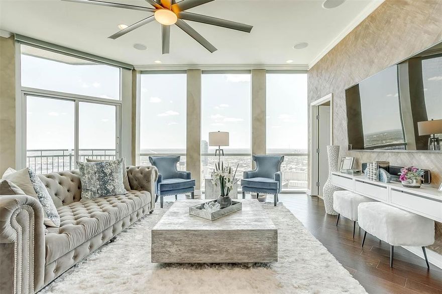 Adore opulent condo living on the 32nd floor with mesmerizing views of Ft. Worth and Sundance Square. This well-designed condo offers a turnkey experience, includes exquisite furnishings and décor, along with appliances such as a washer, dryer, fridge, and TVs. The luxurious kitchen, adorned with quartz countertops, gas cooking, and that view! This living area showcases elegant chandeliers, tall ceilings creating a sophisticated & inviting space for relaxation & entertainment. Floor-to-ceiling windows, equipped with electric shades, unveil miles of mesmerizing east-facing views. The primary suite has a balcony door, sitting area, 2 custom closets, ensuite with separate shower & soaker tub. The Tower has a resort-style pool, al fresco dining areas, barbecue grills, a putting green, a fitness center, and an indoor social center and 24-hour concierge service. With a Walk Score of 92, live your dream or entertain effortlessly in this highly desirable condo.