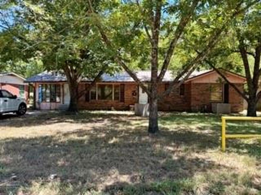 INVESTORS WELCOME! Come snag this 4 bedroom 2 bath home and turn it into a dream! Some demolition already completed. Metal roof is 6 years old. New hot water heater in 2024. Newer AC unit. Original hardwood floors in most of the house still in usuable shape. Kitchen and baths will need remodels. Large lot close to interstate and downtown Sulphur Springs. Sold AS IS. Buyer and buyer's agent responsible for verifying all info.