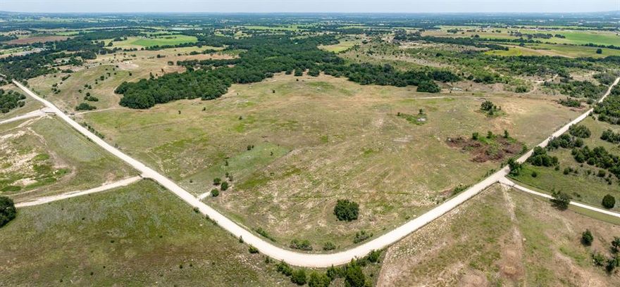 96.324 multi-recreational acreage is now on the market. Located in central Erath County, just minutes from Stephenville, this dynamic piece of property has a range of impressive features that make it unique & offers several options for development, hunting, recreational & agricultural needs. Easy access with over 3,600 ft of road frontage, making it easy to sub-divide if you pleased. The northern front of the property features amazing hilltop views, there is also a tank enhancing the natural beauty & drawing in the abundance of wildlife. Mixture of heavily wooded section through a portion of the center and the remainder consisting of native pastures. Parts of this property could be cultivated and used for hay production, property owner recently did a cleanup and clearing. Whether you are looking for stunning views, for building your forever home, pastures for your cattle or a place for good quality hunting this property is sure to have it covered, a true country paradise & a must see!  Please call to schedule a viewing, the views from the road do not do the property justice, you must drive around on it, to truly appreciate the beauty of this land!