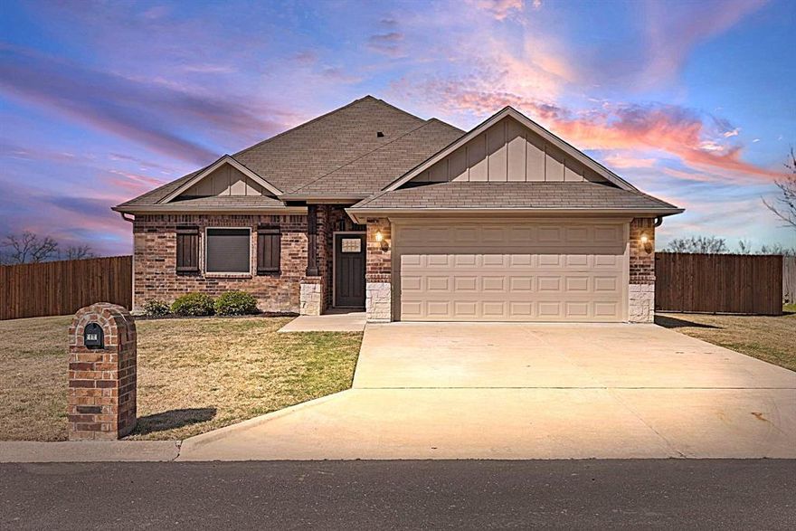 This gorgeous 3-bedroom, 2-bath home with a 2-car garage offers the perfect blend of modern comfort and peaceful country living located on a cul-de-sac in the sought-after Buffalo Mesa Subdivision in Lone Oak! Situated on a spacious lot, there’s plenty of room to add a shop, boat storage, or create your ideal outdoor retreat.  *Bonus* Lake Tawakoni boat ramp access is less than 5 miles away, making weekend lake days effortless! The kitchen features stainless steel appliances, custom cabinetry, subway tile backsplash, a large gathering island, and stunning granite countertops. The private primary suite is a true retreat, highlighted by raised-tray ceilings and a luxurious ensuite bath complete with dual vanities, a soaking garden tub, a fully tiled oversized walk-in shower, and impressive walk-in closets. Two generously sized secondary bedrooms, each with walk-in closets, share a well-appointed full bath with a tub-shower combination. This energy-efficient, all-electric home also includes 9-10 ft ceilings throughout, ceiling fans, finished-out garage, and a newly stained 6-foot privacy fence. The driveway provides additional parking for up to four vehicles. Step outside to enjoy a peaceful backyard that backs to open pasture and mature trees. The covered patio offers the perfect space for grilling, relaxing, and watching kids and pets play in the spacious backyard. Meticulously maintained and built with exceptional attention to detail by J-6 Select, this home feels like new and is located within the desirable Lone Oak ISD. Conveniently located just off Hwy 69, you’re within 30 minutes of Greenville, Quinlan, Emory, Sulphur Springs, Commerce, Terrell, and Royse City—giving you easy access to shopping, dining, entertainment, and everyday conveniences while still enjoying a peaceful rural setting. No HOA! Don’t miss this opportunity to own a beautiful home in a wonderful community near the lake. Schedule your private showing today!