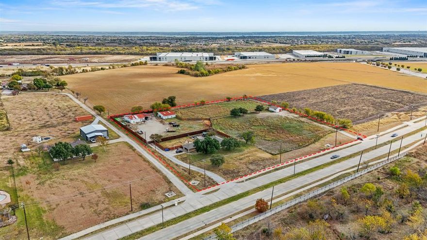 Discover an exceptional opportunity to own 4.65 acres of premium land in one of Rowlett’s most desirable and fastest-growing development corridors. Strategically positioned just off Merritt Road and the President George Bush Turnpike, this property sits within the coveted Northshore Mixed-Use District, offering outstanding potential for future commercial, residential, or mixed-use development. Fully equipped with all major utilities—including water, electricity, sewer, and storm drainage—this site provides a rare combination of immediate functionality and long-term development flexibility.

Currently income-producing, the property includes a 4-bedroom, 2-bath residence of 2,145 sq ft of living space, along with additional revenue streams from storage units and land leases. This makes it an ideal buy-and-hold investment with solid cash flow while planning future development.

Whether you’re a developer, investor, or visionary buyer, this property offers unmatched potential in a high-growth area surrounded by new infrastructure, expanding industrial and retail projects, and master-planned residential communities.