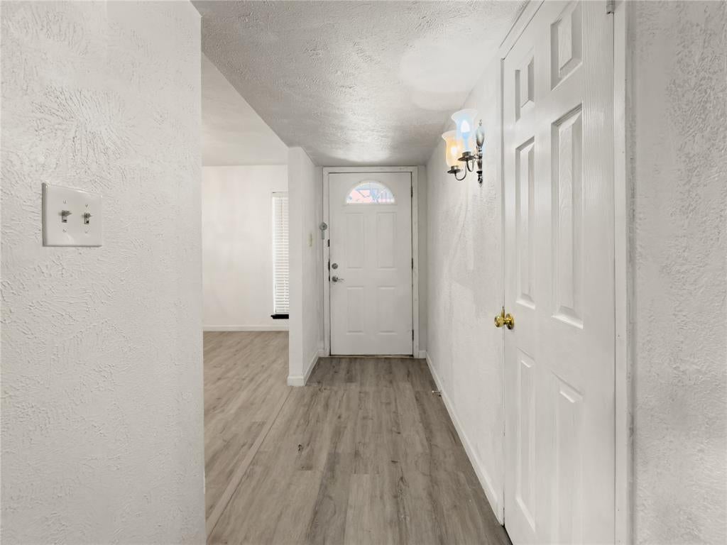 Photo of 7717 Acapulco Road, Fort Worth, TX 76112 (MLS # 21320187)
